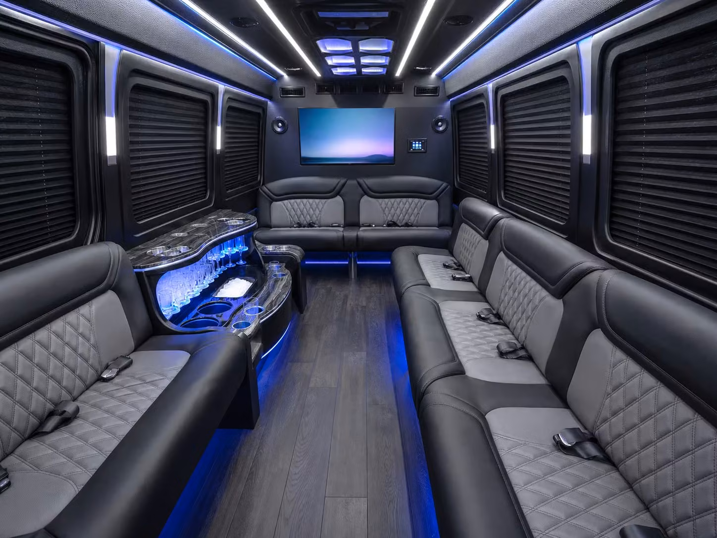 rather than splitting your team across rideshares rent a bus that keeps everyone together